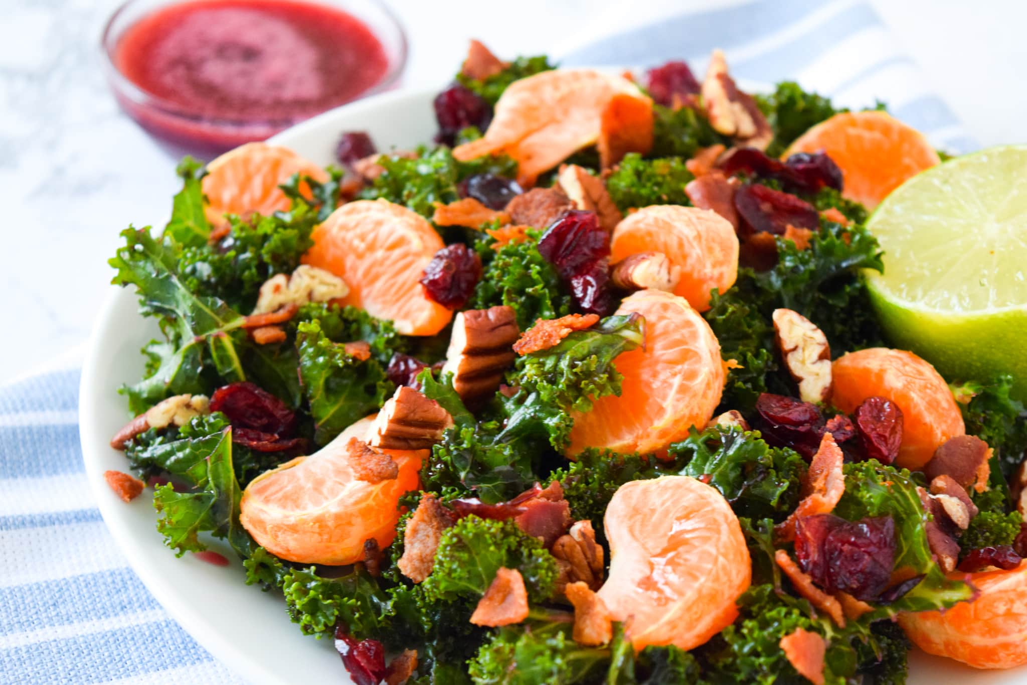 Cranberry and lime kale salad with pecans