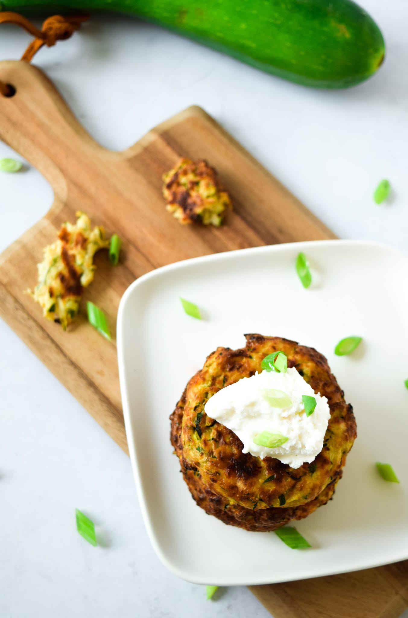 Zucchini Fritter with dollop of sour cream