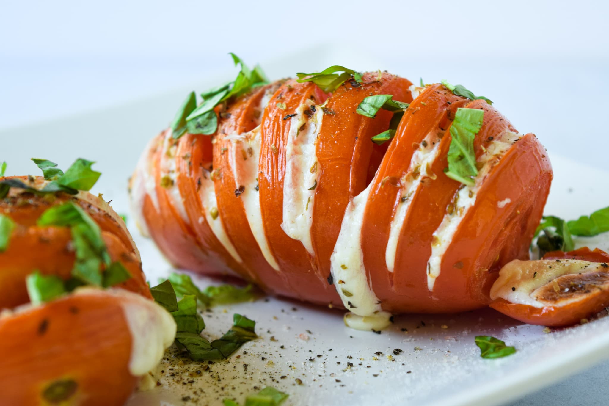 Hasselback Tomatoes with Mozzarella and Basil
