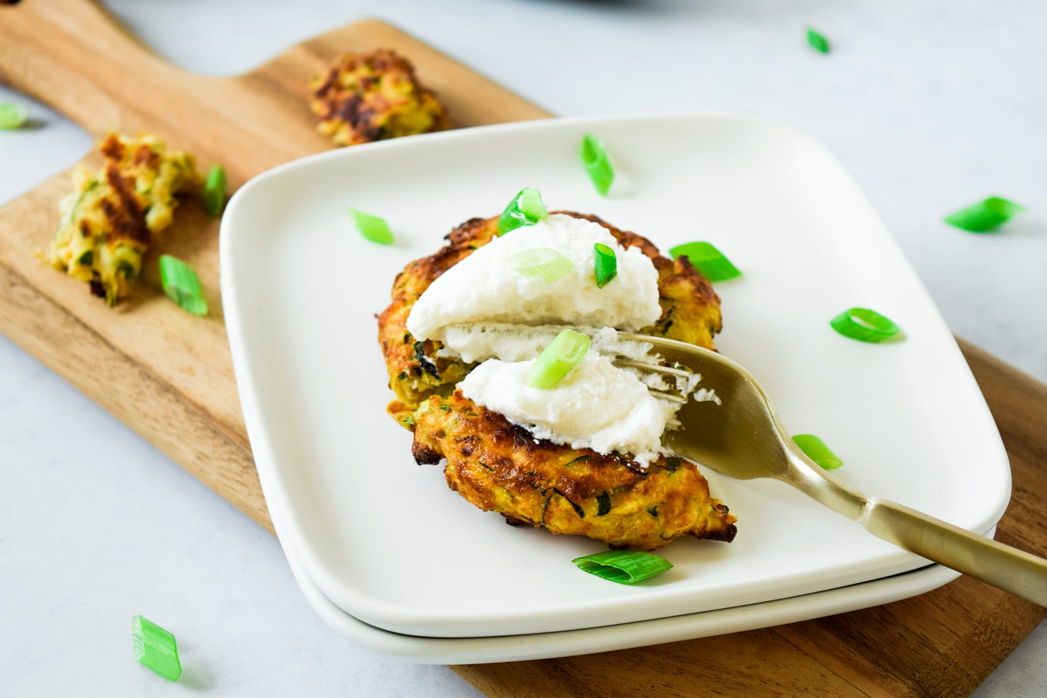 Air Fryer Zucchini Fritter with gold fork