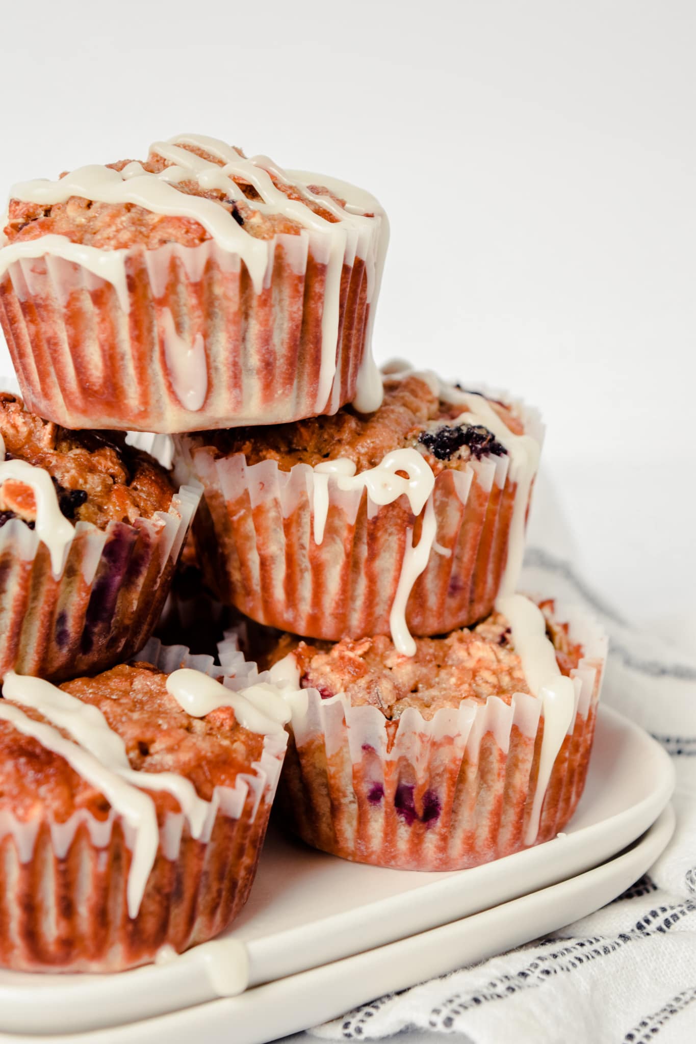 Stack of Mixed Berry Baked Oatmeal Muffins
