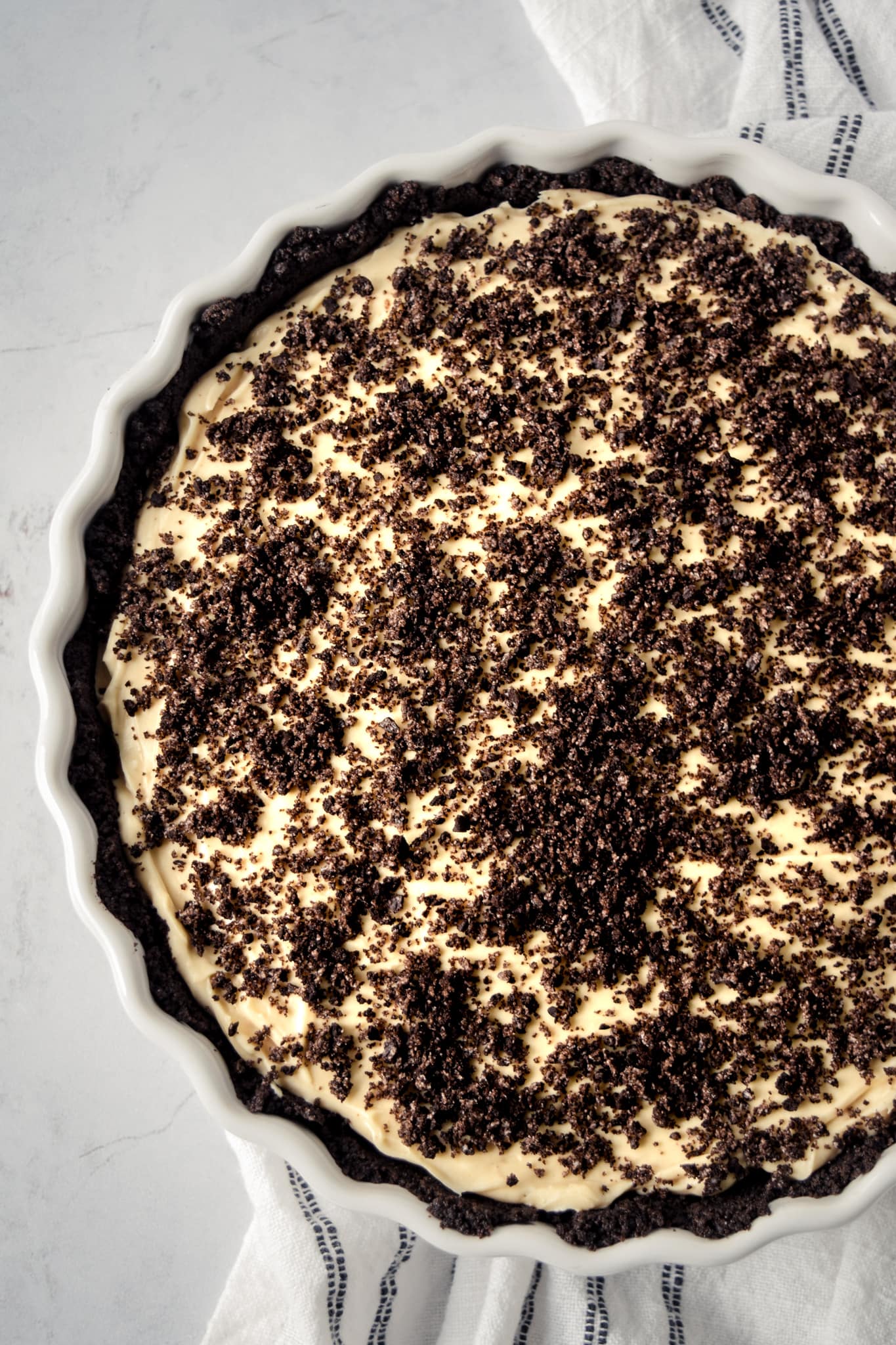 No-Bake Oreo Cheesecake with Peanut Butter in Tart Pan