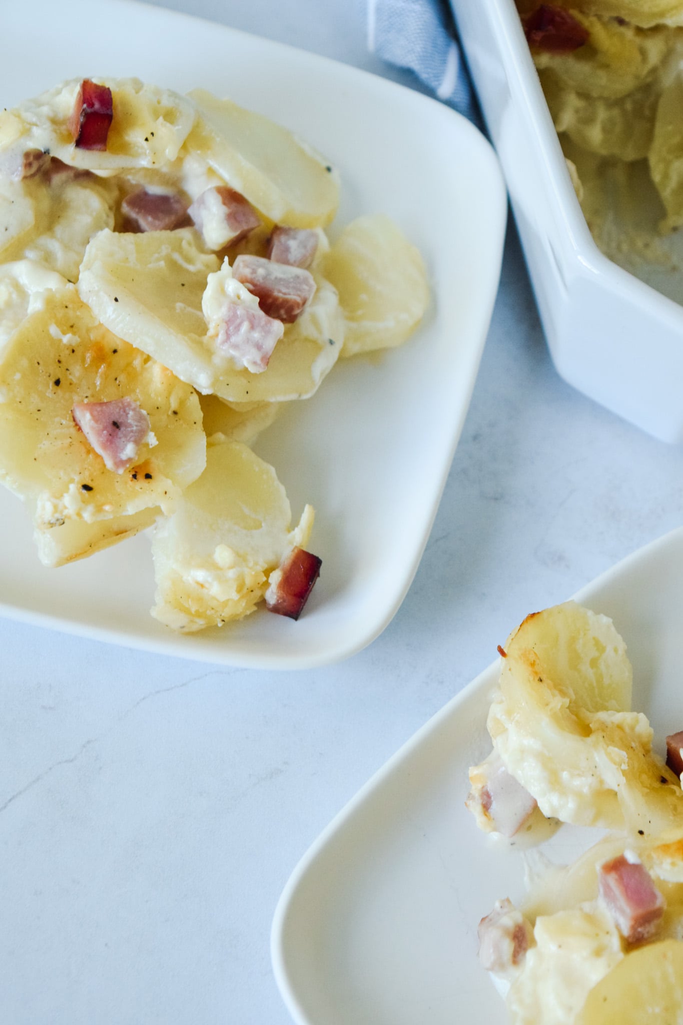 Layered cheesy scalloped potatoes with ham