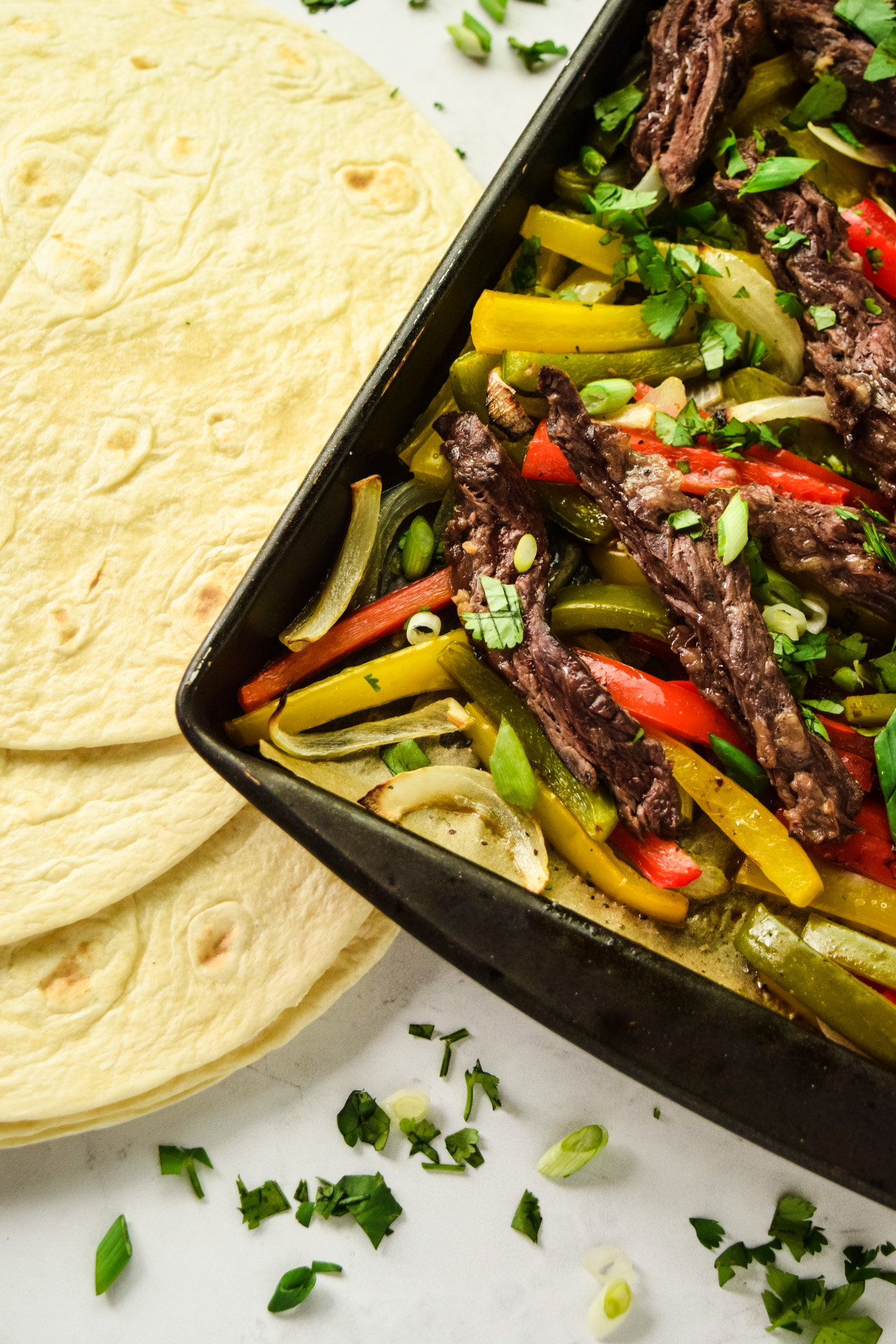 Sheet Pan with Sliced Skirt Steak, Peppers, and Onions