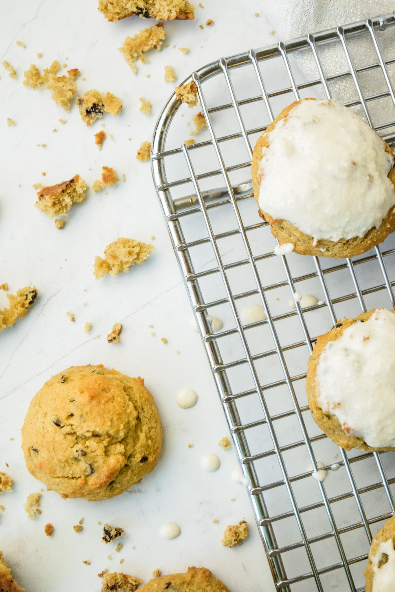 Gluten Free Cannoli Cookies on Cooling Rack with Ricotta Glaze
