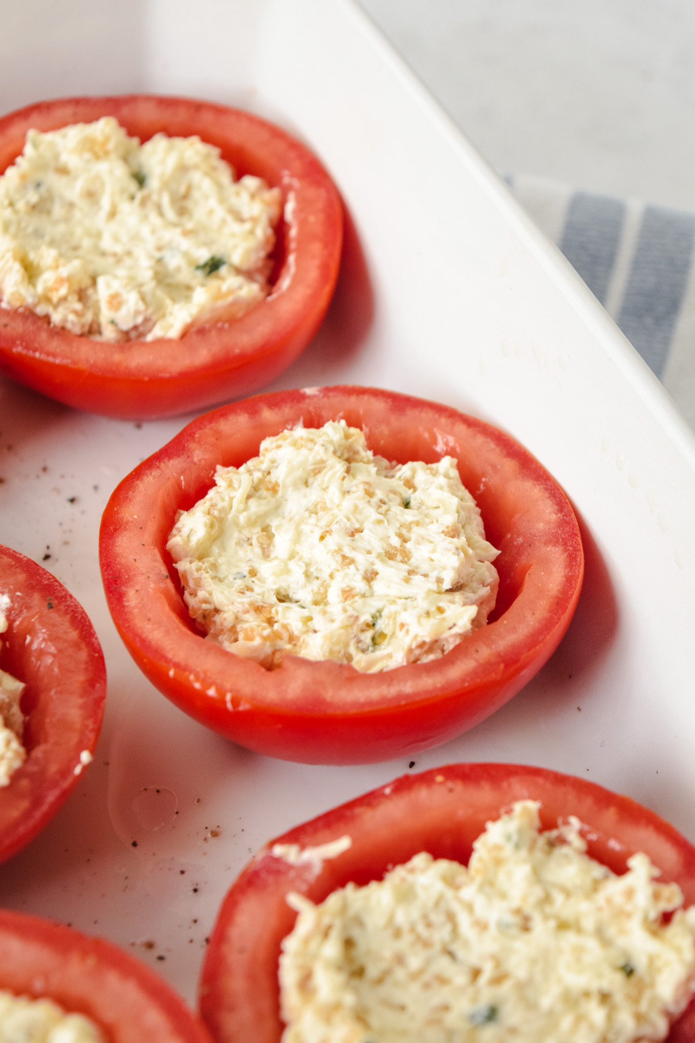 Tomatoes Filled with Cream Cheese in Crate and Barrel White Baking Dish