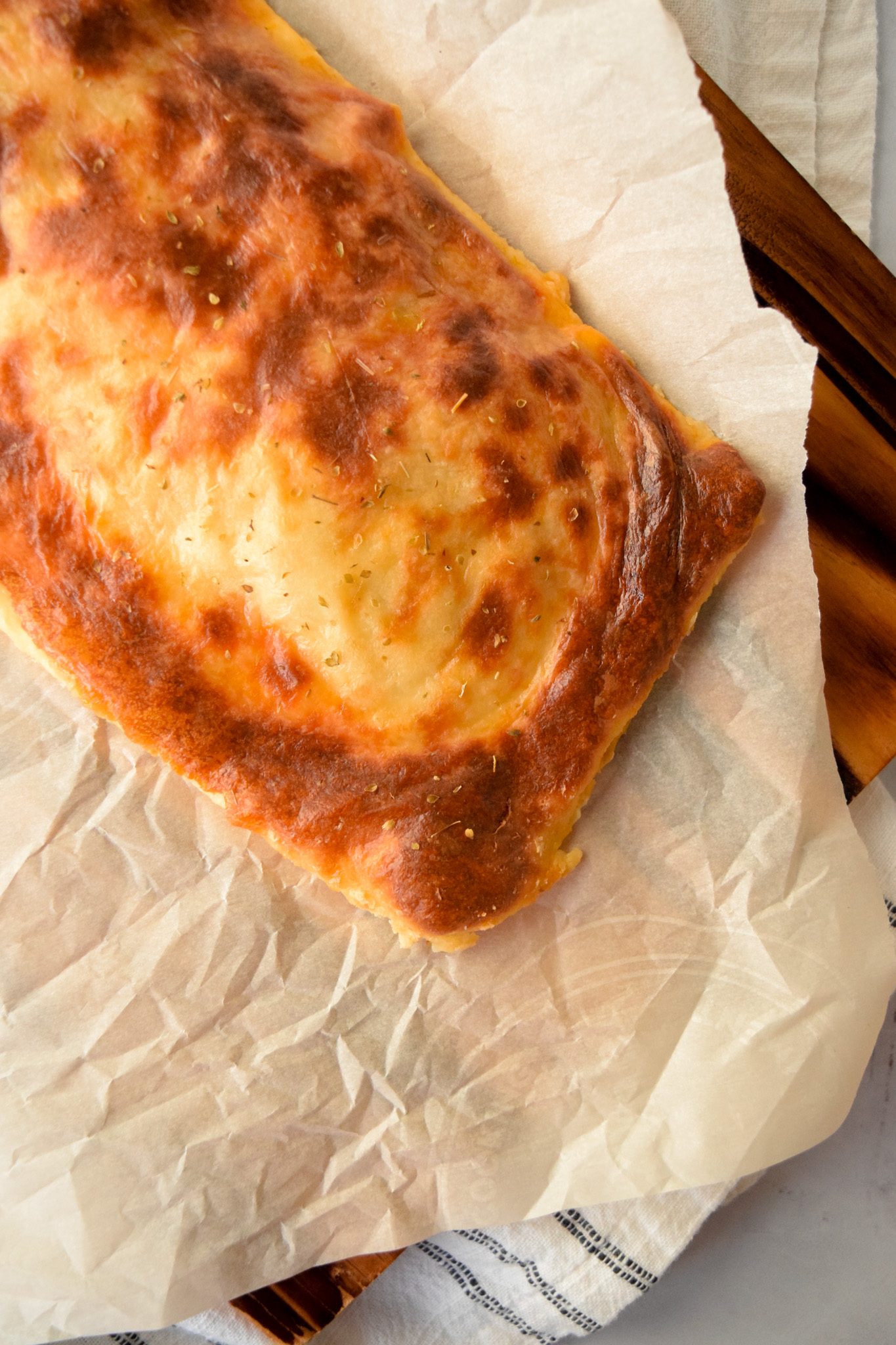 keto stromboli with a flatbread cheese crust