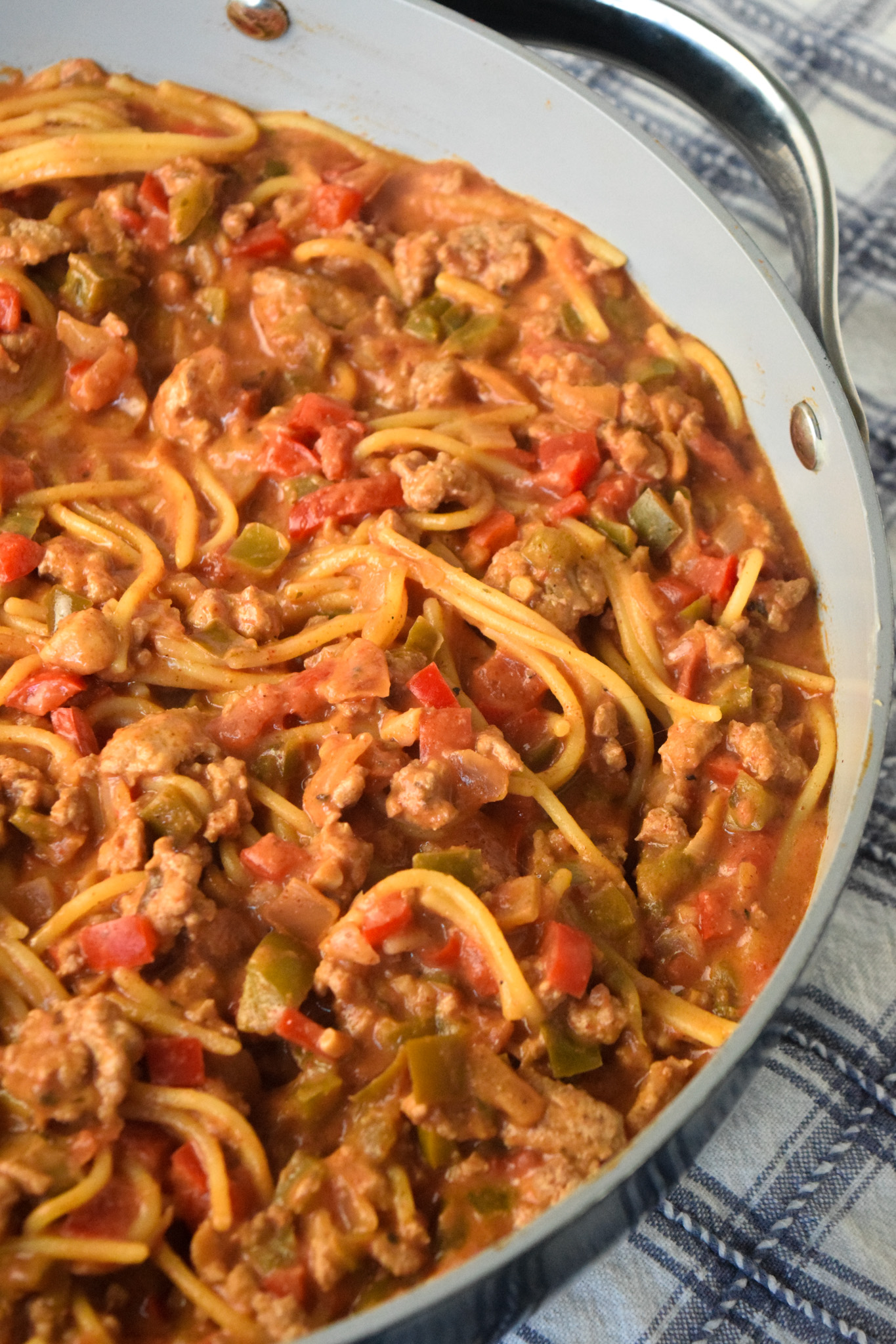 gluten free taco spaghetti in a navy blue caraway skillet