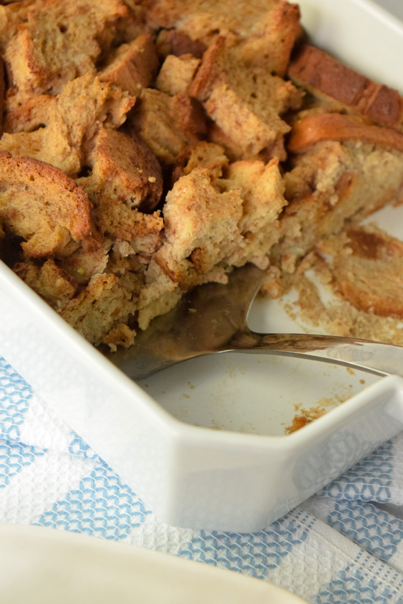 Gluten free French toast casserole in a white baking dish
