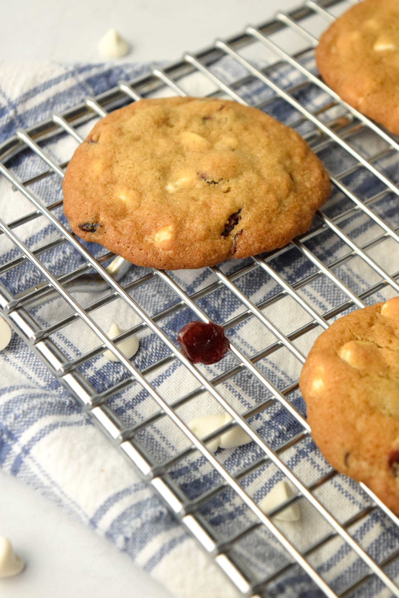 Gluten Free White Chocolate Cranberry Cookies on a Cooling Rack