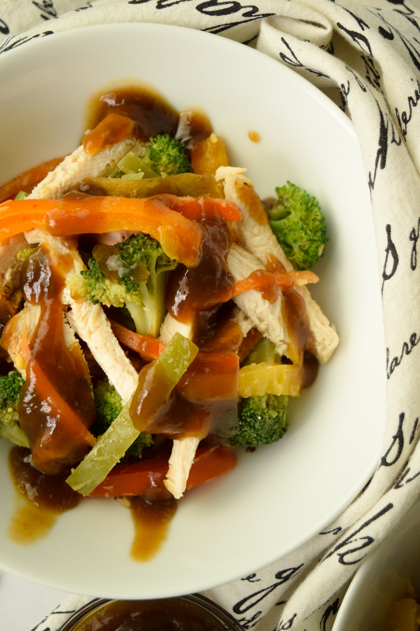 Close Up of White Bowl with Chicken Teriyaki Stir Fry