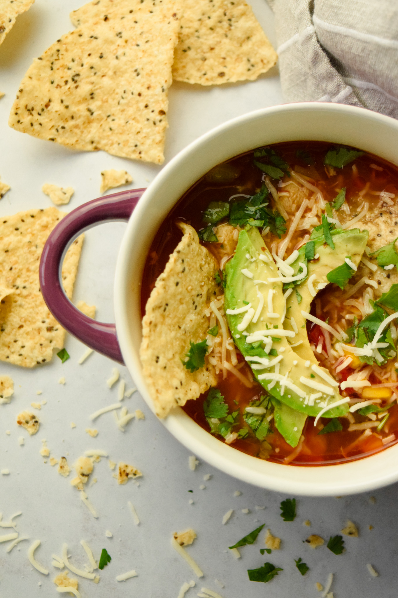 Bowl of Chicken Taco Soup with Tortilla Chips